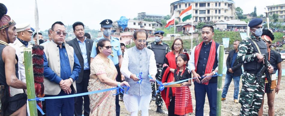 Governor Mukhi and his wife inaugurating the exhibition stalls at the Phom Day celebrations at Public Ground, Longleng on June 6. (DIPR Photo)